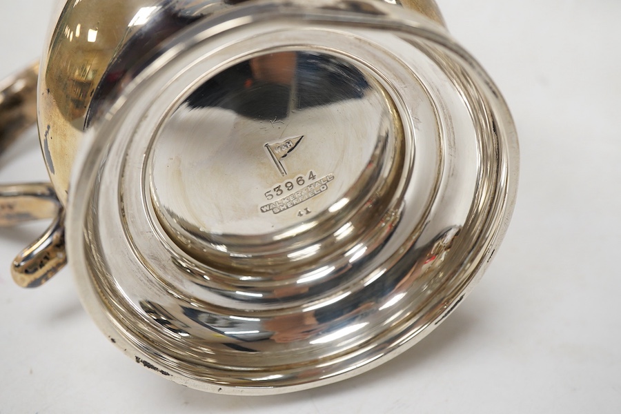 A George V silver mug by Walker & Hall, Sheffield, 1921, on a circular foot, height 12.5cm, 9.5oz.